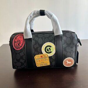 Coach men's pillow bag, size 24 x 14 x 11cm